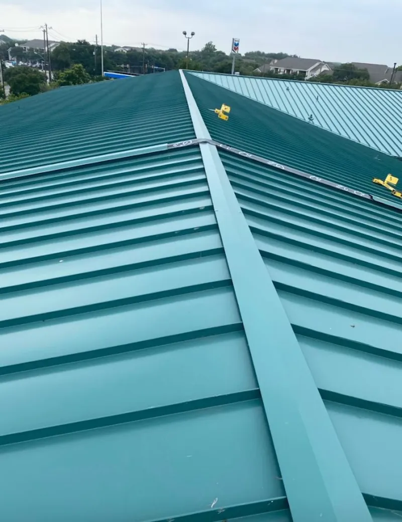 Green commercial metal roof ridge and valley for Metal Roof Repair in North Kingstown