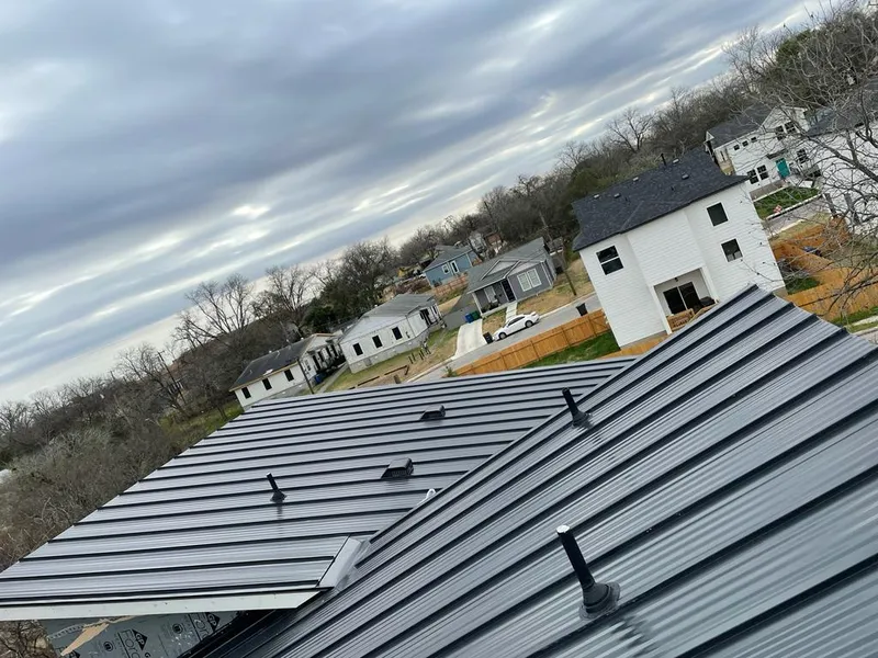 Standing seam metal roof panels with vents for Skylight Repair in North Kingstown